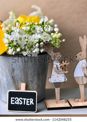 funny easter bunnies in love with flowers in metal bucket. Romantic easter wallpaper