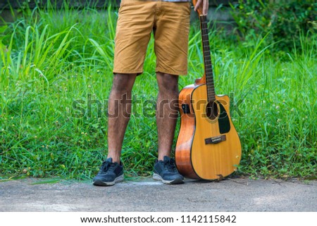 man and guitar