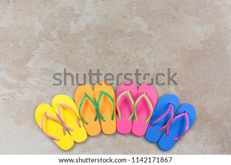 Rubber sandals flip flops on floor