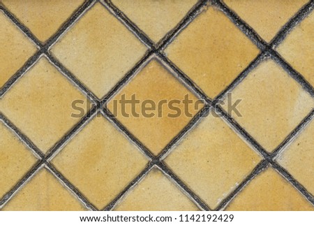 Mosaic tiles, Yellow diagonal Wall or floor tile, high resolution real photo for interior backdrop background texture purpose.