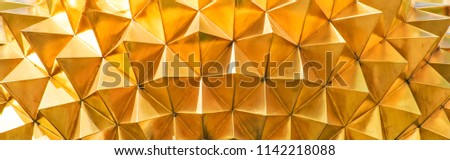 Geometric texture of gold-plated metal