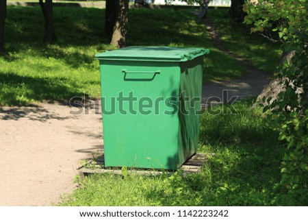 green container for garbage collection