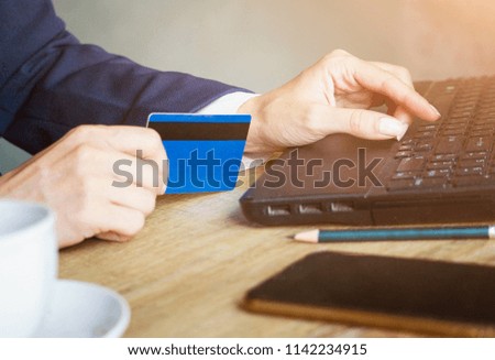 Photo businesswoman working with  notebook. Online payments, banking, hands keyboard . horizontal mockup