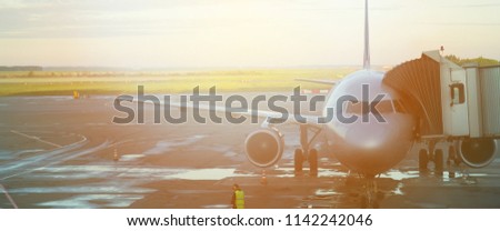 banner for website, airplane taking off from the airport. fragment of the body of aircraft. business travel concept vintage style picture