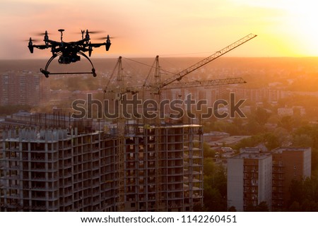 Drone over building construction.