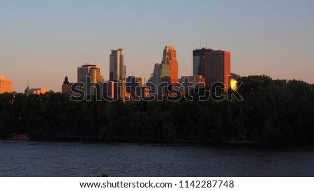 Sunset Skyline of Minneapolis with Lighthouse
