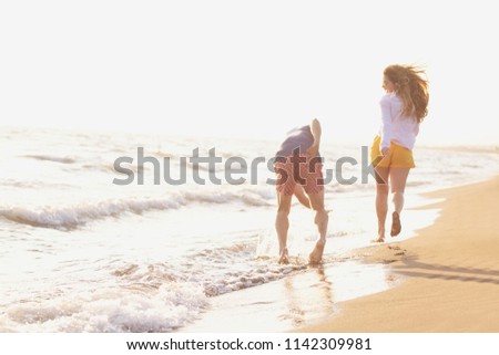 Beach of summer time and two lovers