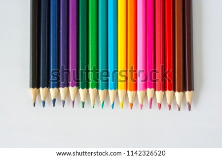 Colorful wooden pencils isolated on white background