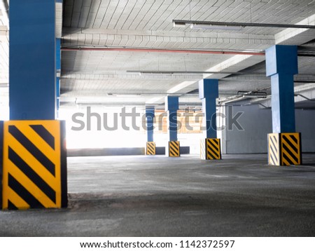 Empty underground parking background with copy space. Economy Of Land Resourses Concept