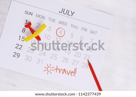 Summer Calendar Schedule, with toy airplane. Travel, tourism, holiday concept.