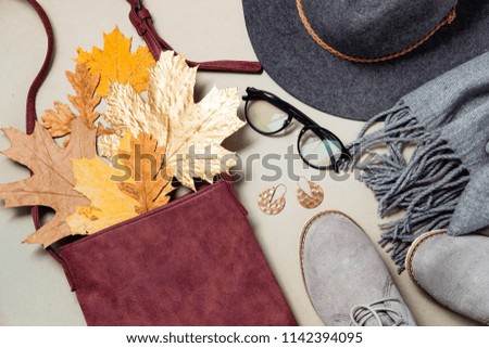 Adventure and wanderlust concept image with travel accessories. Accessories for travel top view on wooden background with copy space 