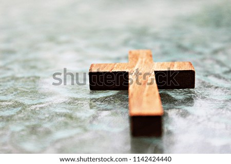 Religion. cross (of Jesus Christ) On the glass floor, watermark. Backgrounds
