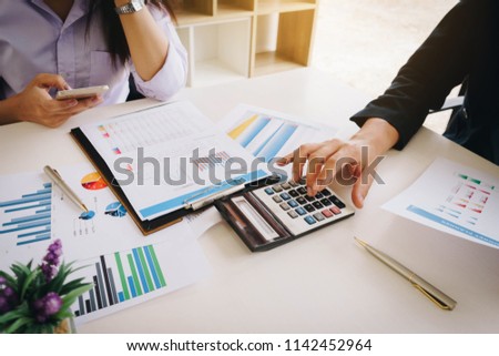 Business people meeting to analyze and discuss the situation on the financial report in meeting room. Meeting planning budget and cost. Business financial analysis and strategy concept. Royalty-Free Stock Photo #1142452964