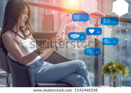 Asian woman using tablet computer, social media, chat, shopping, texting, love, online shopping, check mail, searching, typing message..