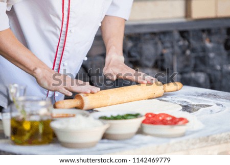 cooking pizza chef in a restaurant