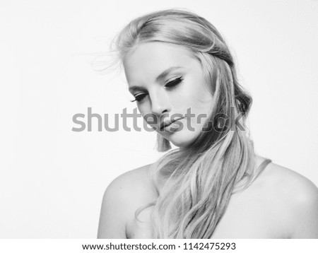 Woman with long blonde hair beauty face monochrome isolated on white