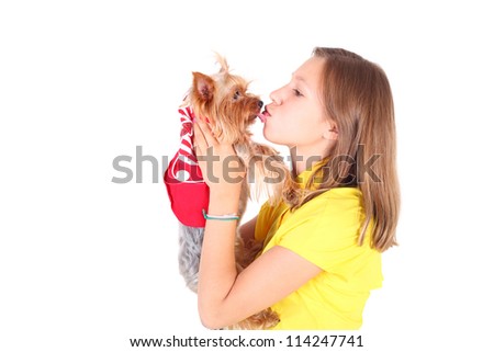 pretty young girl kissing her cute little dog