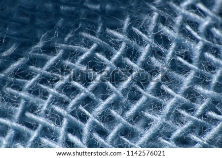 Ultra macro backgrounds of natural and artificial fabric for textile and clothing design. Microstructure of the material Royalty-Free Stock Photo #1142576021
