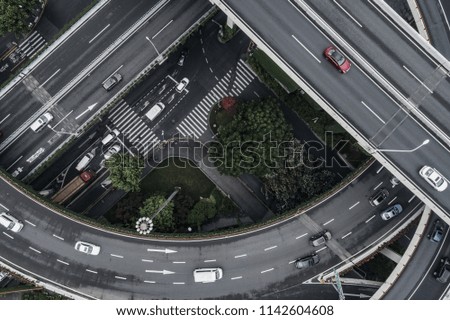 Aerial view of highway and overpass in city