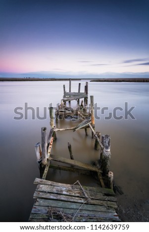 Wide angle landscape image of an old jetty on the Berg river Estuary on the West Coast of South Africa