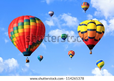 colorful hot air balloons over blue sky Royalty-Free Stock Photo #114265378