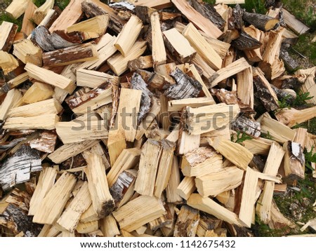 Birchwood chopped in pile for the fireplace 