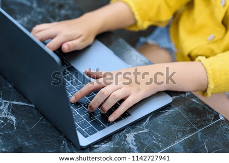 The freelance women using laptop on the table