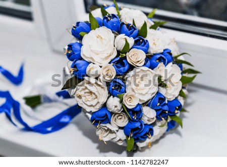 wedding bouquet with white and blue flowers