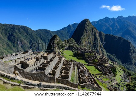 A view of the ruins of Machu Picchu, with Huayna Picchu in the background.