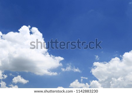 Clouds in the sky blue background