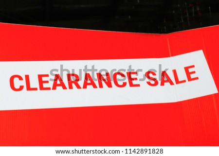 Sales promotional offer for customers - stating clearance sale of goods and services - RF stock image with red background for copyspace
