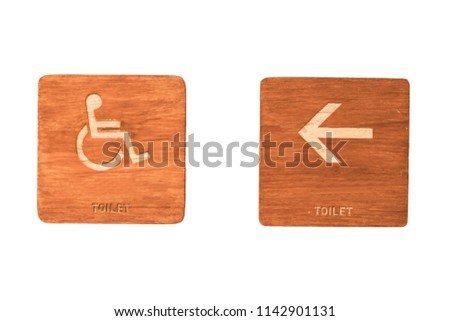 Wooden toilet signs and direction arrow isolated on white background.