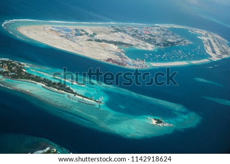 aerial view of Male capital city, Maldives islands from plane