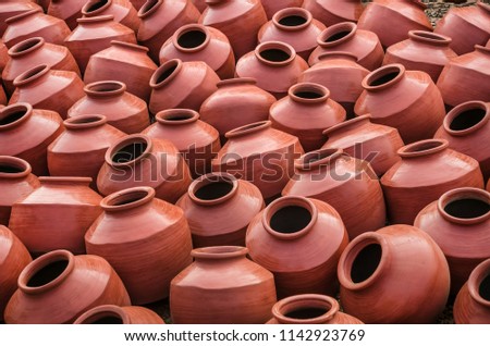 Collection of terracotta clay pots made from mud also known as Matka. Clay pots are used since ancient times and can be found in Indian subcontinent.
