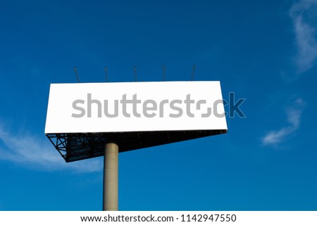 triangular Billboard on blue sky background