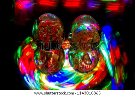 Colorful Light Painting Photography With Cristal Ball Against Black Background
