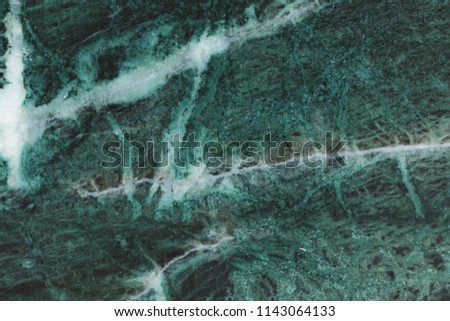 Green background, malachite deep green natural marble texture, detailed close up texture with amazing white geode in high resolution, macro photo of green natural malachite marble