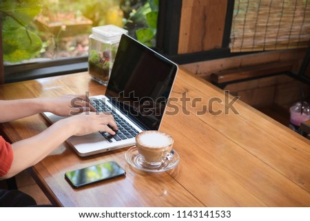 asian woman using laptop