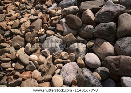 A close up of a pile of rocks in a way that explodes the texture and feel.
