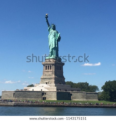 View of the Statue of Liberty in New York, USA. The Statue of Liberty is a colossal neoclassical sculpture on Liberty Island in New York Harbor in New York City. gift of friendship from the France.