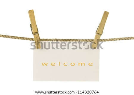 welcome paper hang on clothesline with clipping path
