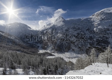 Stunning snowy sunny mountain landscape, Val d'Aosta, Italy