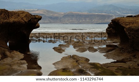El Confital, reefs of sandstone and low tide, coast of Las Palmas de Gran Canaria, Canary Islands