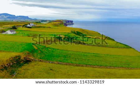 The beautiful green landscape of the Isle of Skye in the Scottish Highlands
