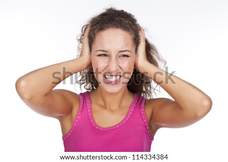 Closeup of pretty young woman suffering from head...