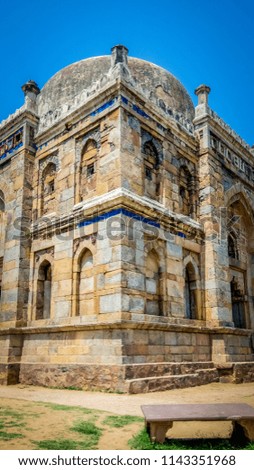 A full size photo of the impressive architecture of the tomb of Muhammad Shah which is located in the Lodi Gardens or Lodhi Gardens, a beautiful touristic city park situated in New Delhi, India, Asia.