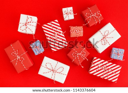 Handmade gifts collection for Christmas, Thanksgiving or Valentine Day on a red background. Mock up.