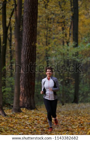 Full-length image of brunette on morning run