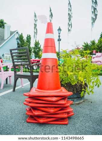 Many traffic cone in car park