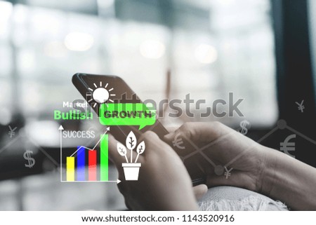 Fintech various currencies sign icon and market stock graph screen of smartphone with colorful bokeh blur background. Financial business technology freedom dream life using internet concept.